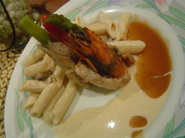 Steamed Roulade of Chicken Stuffed with Prawn & Asparagus, with Shiitake Creme Penne