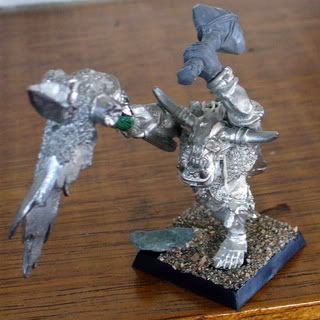 http://i75.photobucket.com/albums/i303/zelophahad/Cave%20Orcs/WarbossfootWIP.jpg