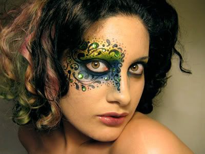  her over-extravagant makeup, she is pretty, but not overly beautiful.