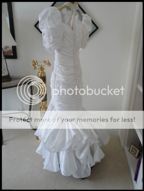 the quality of this dress please see photo s and measurements below 